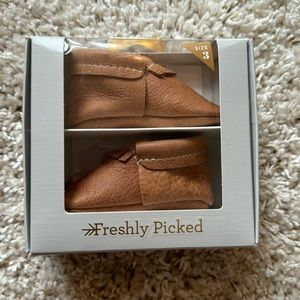 Freshly picked baby shoes